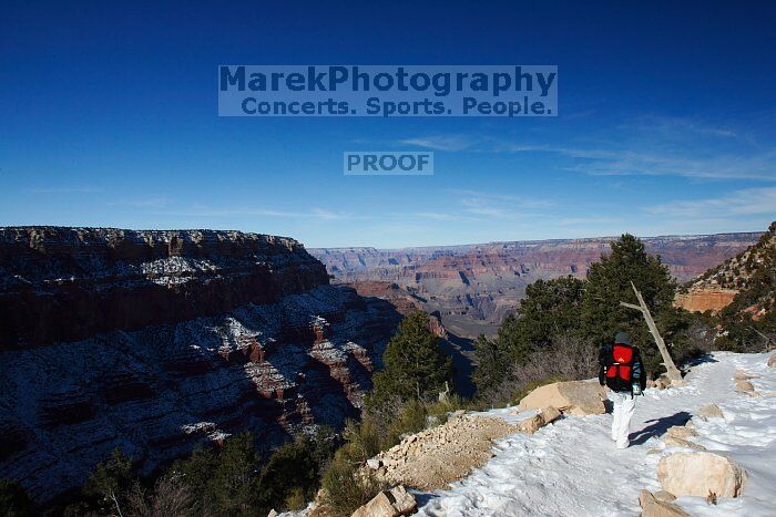 Beth Marek hiking down the South Kaibab trail, backpacking the Grand Canyon with Beth, Thursday, January 1, 2009.

Filename: SRM_20090101_12012363.jpg
Aperture: f/16.0
Shutter Speed: 1/200
Body: Canon EOS-1D Mark II
Lens: Canon EF 16-35mm f/2.8 L