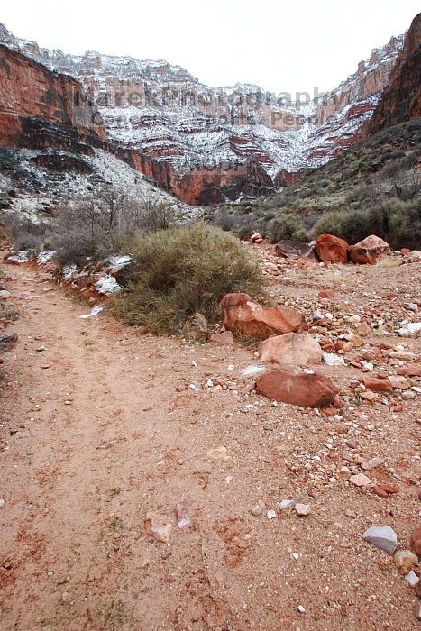 Hike up the Bright Angel trail from Indian Gardens campground, while backpacking the Grand Canyon, on Sunday, January 4, 2009.

Filename: SRM_20090104_08433453.JPG
Aperture: f/8.0
Shutter Speed: 1/15
Body: Canon EOS-1D Mark II
Lens: Canon EF 16-35mm f/2.8 L
