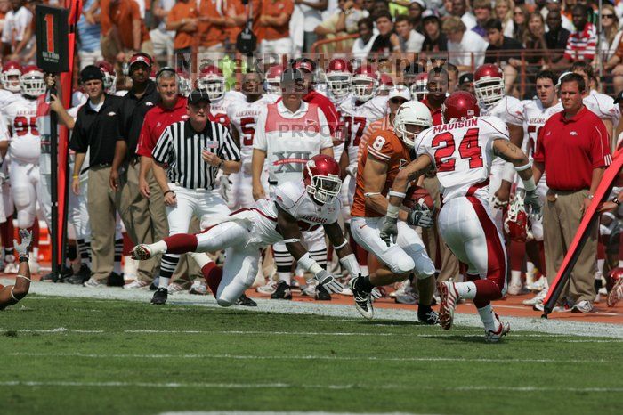 The University of Texas football team defeated the Arkansas Razorbacks with a score of 52-10 in Austin, TX on Saturday, September 27, 2008.

Filename: SRM_20080927_14400283.jpg
Aperture: f/5.6
Shutter Speed: 1/4000
Body: Canon EOS-1D Mark II
Lens: Canon EF 300mm f/2.8 L IS