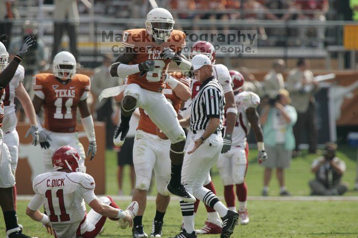 The University of Texas football team defeated the Arkansas Razorbacks with a score of 52-10 in Austin, TX on Saturday, September 27, 2008.

Filename: SRM_20080927_15462254.jpg
Aperture: f/5.6
Shutter Speed: 1/1250
Body: Canon EOS-1D Mark II
Lens: Canon EF 300mm f/2.8 L IS