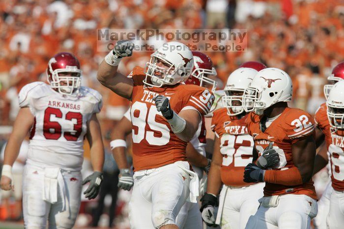The University of Texas football team defeated the Arkansas Razorbacks with a score of 52-10 in Austin, TX on Saturday, September 27, 2008.

Filename: SRM_20080927_16520435.jpg
Aperture: f/5.6
Shutter Speed: 1/3200
Body: Canon EOS-1D Mark II
Lens: Canon EF 300mm f/2.8 L IS