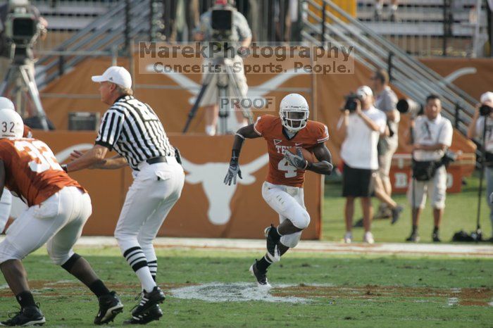 The University of Texas football team defeated the Arkansas Razorbacks with a score of 52-10 in Austin, TX on Saturday, September 27, 2008.

Filename: SRM_20080927_17161671.jpg
Aperture: f/5.6
Shutter Speed: 1/1000
Body: Canon EOS-1D Mark II
Lens: Canon EF 300mm f/2.8 L IS