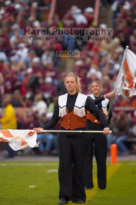 The University of Texas, Austin played Texas A&M in football at Kyle Field, College Station, on November 23, 2007.  UT lost to the Aggies, 30 to 38.

Filename: SRM_20071123_1723162.jpg
Aperture: f/2.8
Shutter Speed: 1/1000
Body: Canon EOS-1D Mark II
Lens: Canon EF 300mm f/2.8 L IS