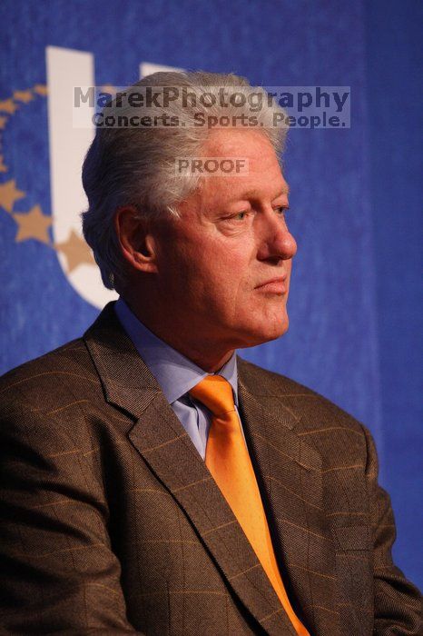Former President Bill Clinton listens to UT President William Powers Jr. speak at the opening plenary session of the CGIU meeting.  Day one of the 2nd Annual Clinton Global Initiative University (CGIU) meeting was held at The University of Texas at Austin, Friday, February 13, 2009.

Filename: SRM_20090213_16345755.jpg
Aperture: f/2.8
Shutter Speed: 1/320
Body: Canon EOS 20D
Lens: Canon EF 300mm f/2.8 L IS