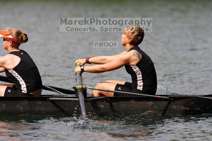 The Texas Rowing second novice eight team, with coxswain Emma Dirks, Sharon Dietz, Lucia Babar, Kait Postle, Ashley Hiatt, Andrea Janowski, Madonna Bregon, Daryn Ofczarzak and Dani Mohling, finished with a time of 8:07.5, losing to Wisconsin, which completed the race in 7:47.1. This was the third session of the Longhorn Invitational, Saturday afternoon, March 21, 2009 on Lady Bird Lake.  They won a total of three races over the weekend.

Filename: SRM_20090321_16013809.jpg
Aperture: f/5.6
Shutter Speed: 1/2500
Body: Canon EOS-1D Mark II
Lens: Canon EF 300mm f/2.8 L IS