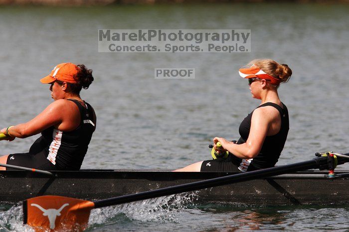 The Texas Rowing second novice eight team, with coxswain Emma Dirks, Sharon Dietz, Lucia Babar, Kait Postle, Ashley Hiatt, Andrea Janowski, Madonna Bregon, Daryn Ofczarzak and Dani Mohling, finished with a time of 8:07.5, losing to Wisconsin, which completed the race in 7:47.1. This was the third session of the Longhorn Invitational, Saturday afternoon, March 21, 2009 on Lady Bird Lake.  They won a total of three races over the weekend.

Filename: SRM_20090321_16013810.jpg
Aperture: f/5.6
Shutter Speed: 1/2500
Body: Canon EOS-1D Mark II
Lens: Canon EF 300mm f/2.8 L IS