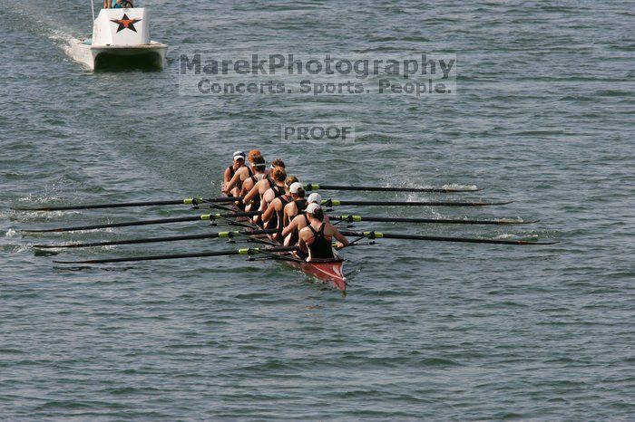 The Texas Rowing first varsity eight team, with coxswain Mary Cait McPherson, stroke Jen VanderMaarel, Felicia Izaguirre-Werner, Meg George, Nancy Arrington, Jelena Zunic, Karli Sheahan, Colleen Irby and Sara Cottingham, finished with a time of 7:09.3, losing to Wisconsin, which completed the race in 7:01.1. This was the third session of the Longhorn Invitational, Saturday afternoon, March 21, 2009 on Lady Bird Lake.

Filename: SRM_20090321_16352297.jpg
Aperture: f/8.0
Shutter Speed: 1/1600
Body: Canon EOS-1D Mark II
Lens: Canon EF 300mm f/2.8 L IS