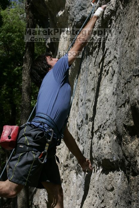 Javier Morales on the dyno while leading Lick the Window (5.10c).  It was another long day of rock climbing at Seismic Wall on Austin's Barton Creek Greenbelt, Sunday, April 5, 2009.

Filename: SRM_20090405_11431265.jpg
Aperture: f/10.0
Shutter Speed: 1/500
Body: Canon EOS-1D Mark II
Lens: Canon EF 80-200mm f/2.8 L