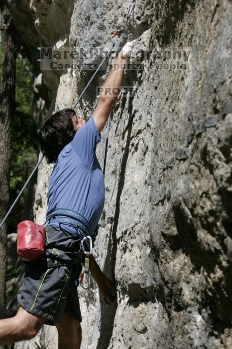Javier Morales on the dyno while leading Lick the Window (5.10c).  It was another long day of rock climbing at Seismic Wall on Austin's Barton Creek Greenbelt, Sunday, April 5, 2009.

Filename: SRM_20090405_11452775.jpg
Aperture: f/5.6
Shutter Speed: 1/500
Body: Canon EOS-1D Mark II
Lens: Canon EF 80-200mm f/2.8 L