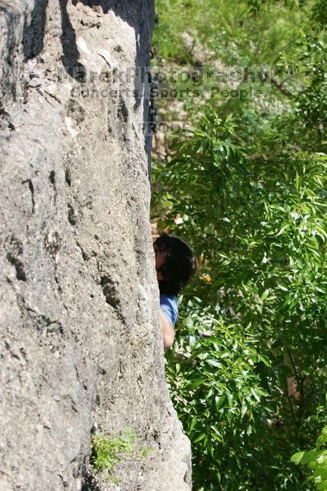 Javier Morales leading up Nose Print on the Windshield (5.11c), shot from the top of Ack! (5.11b, but using the crack for the start instead) that I top roped up with my camera on my back.  It was another long day of rock climbing at Seismic Wall on Austin's Barton Creek Greenbelt, Sunday, April 5, 2009.

Filename: SRM_20090405_13055395.jpg
Aperture: f/5.6
Shutter Speed: 1/400
Body: Canon EOS-1D Mark II
Lens: Canon EF 80-200mm f/2.8 L