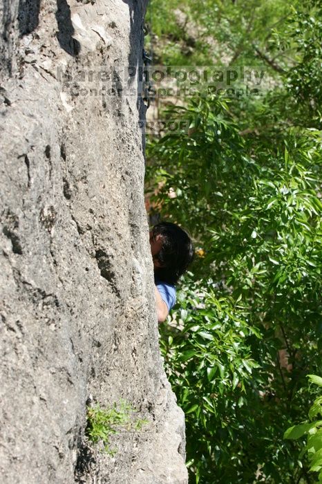 Javier Morales leading up Nose Print on the Windshield (5.11c), shot from the top of Ack! (5.11b, but using the crack for the start instead) that I top roped up with my camera on my back.  It was another long day of rock climbing at Seismic Wall on Austin's Barton Creek Greenbelt, Sunday, April 5, 2009.

Filename: SRM_20090405_13055497.jpg
Aperture: f/6.3
Shutter Speed: 1/400
Body: Canon EOS-1D Mark II
Lens: Canon EF 80-200mm f/2.8 L
