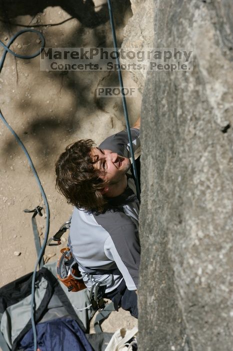 Andrew Dreher attempting the dyno while leading Lick the Window (5.10c), shot from the top of Ack! (5.11b, but using the crack for the start instead) that I top roped up with my camera on my back.  It was another long day of rock climbing at Seismic Wall on Austin's Barton Creek Greenbelt, Sunday, April 5, 2009.

Filename: SRM_20090405_13155705.jpg
Aperture: f/10.0
Shutter Speed: 1/500
Body: Canon EOS-1D Mark II
Lens: Canon EF 80-200mm f/2.8 L