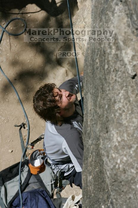 Andrew Dreher attempting the dyno while leading Lick the Window (5.10c), shot from the top of Ack! (5.11b, but using the crack for the start instead) that I top roped up with my camera on my back.  It was another long day of rock climbing at Seismic Wall on Austin's Barton Creek Greenbelt, Sunday, April 5, 2009.

Filename: SRM_20090405_13155806.jpg
Aperture: f/10.0
Shutter Speed: 1/500
Body: Canon EOS-1D Mark II
Lens: Canon EF 80-200mm f/2.8 L