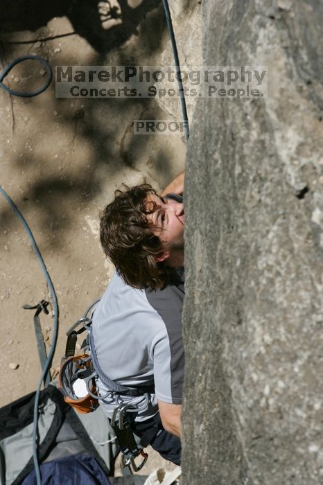 Andrew Dreher attempting the dyno while leading Lick the Window (5.10c), shot from the top of Ack! (5.11b, but using the crack for the start instead) that I top roped up with my camera on my back.  It was another long day of rock climbing at Seismic Wall on Austin's Barton Creek Greenbelt, Sunday, April 5, 2009.

Filename: SRM_20090405_13155807.jpg
Aperture: f/10.0
Shutter Speed: 1/500
Body: Canon EOS-1D Mark II
Lens: Canon EF 80-200mm f/2.8 L