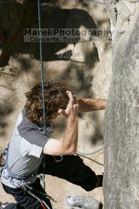 Andrew Dreher attempting the dyno while leading Lick the Window (5.10c), shot from the top of Ack! (5.11b, but using the crack for the start instead) that I top roped up with my camera on my back.  It was another long day of rock climbing at Seismic Wall on Austin's Barton Creek Greenbelt, Sunday, April 5, 2009.

Filename: SRM_20090405_13155913.jpg
Aperture: f/8.0
Shutter Speed: 1/500
Body: Canon EOS-1D Mark II
Lens: Canon EF 80-200mm f/2.8 L