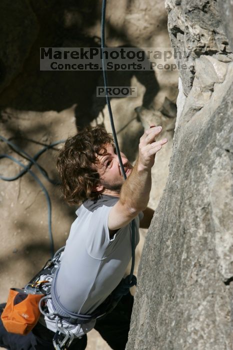 Andrew Dreher attempting the dyno while leading Lick the Window (5.10c), shot from the top of Ack! (5.11b, but using the crack for the start instead) that I top roped up with my camera on my back.  It was another long day of rock climbing at Seismic Wall on Austin's Barton Creek Greenbelt, Sunday, April 5, 2009.

Filename: SRM_20090405_13162916.jpg
Aperture: f/10.0
Shutter Speed: 1/500
Body: Canon EOS-1D Mark II
Lens: Canon EF 80-200mm f/2.8 L