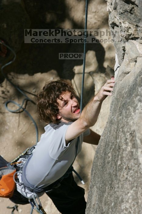 Andrew Dreher attempting the dyno while leading Lick the Window (5.10c), shot from the top of Ack! (5.11b, but using the crack for the start instead) that I top roped up with my camera on my back.  It was another long day of rock climbing at Seismic Wall on Austin's Barton Creek Greenbelt, Sunday, April 5, 2009.

Filename: SRM_20090405_13162917.jpg
Aperture: f/9.0
Shutter Speed: 1/500
Body: Canon EOS-1D Mark II
Lens: Canon EF 80-200mm f/2.8 L