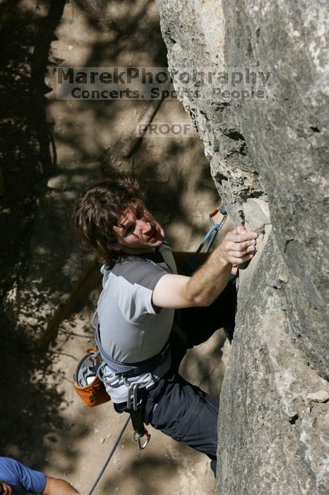 Andrew Dreher leading Lick the Window (5.10c), shot from the top of Ack! (5.11b, but using the crack for the start instead) that I top roped up with my camera on my back.  It was another long day of rock climbing at Seismic Wall on Austin's Barton Creek Greenbelt, Sunday, April 5, 2009.

Filename: SRM_20090405_13214354.jpg
Aperture: f/10.0
Shutter Speed: 1/500
Body: Canon EOS-1D Mark II
Lens: Canon EF 80-200mm f/2.8 L
