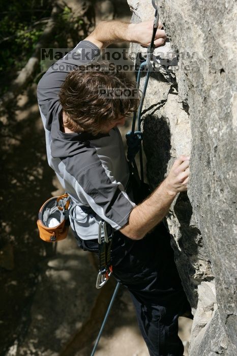 Andrew Dreher leading Lick the Window (5.10c), shot from the top of Ack! (5.11b, but using the crack for the start instead) that I top roped up with my camera on my back.  It was another long day of rock climbing at Seismic Wall on Austin's Barton Creek Greenbelt, Sunday, April 5, 2009.

Filename: SRM_20090405_13223479.jpg
Aperture: f/9.0
Shutter Speed: 1/500
Body: Canon EOS-1D Mark II
Lens: Canon EF 80-200mm f/2.8 L