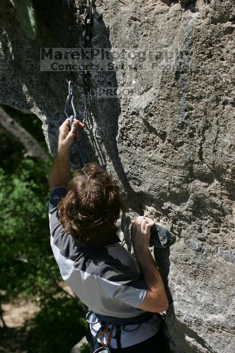 Andrew Dreher leading Lick the Window (5.10c), shot from the top of Ack! (5.11b, but using the crack for the start instead) that I top roped up with my camera on my back.  It was another long day of rock climbing at Seismic Wall on Austin's Barton Creek Greenbelt, Sunday, April 5, 2009.

Filename: SRM_20090405_13241938.jpg
Aperture: f/5.0
Shutter Speed: 1/500
Body: Canon EOS-1D Mark II
Lens: Canon EF 80-200mm f/2.8 L