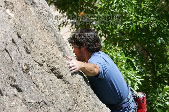 Javier Morales leading Nose Print on the Windshield (5.11c), shot from the top of Ack! (5.11b, but using the crack for the start instead) that I top roped up with my camera on my back.  It was another long day of rock climbing at Seismic Wall on Austin's Barton Creek Greenbelt, Sunday, April 5, 2009.

Filename: SRM_20090405_13335882.jpg
Aperture: f/9.0
Shutter Speed: 1/500
Body: Canon EOS-1D Mark II
Lens: Canon EF 80-200mm f/2.8 L