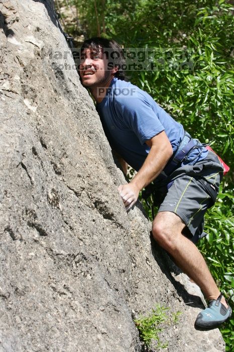 Javier Morales leading Nose Print on the Windshield (5.11c), shot from the top of Ack! (5.11b, but using the crack for the start instead) that I top roped up with my camera on my back.  It was another long day of rock climbing at Seismic Wall on Austin's Barton Creek Greenbelt, Sunday, April 5, 2009.

Filename: SRM_20090405_13340888.jpg
Aperture: f/9.0
Shutter Speed: 1/500
Body: Canon EOS-1D Mark II
Lens: Canon EF 80-200mm f/2.8 L