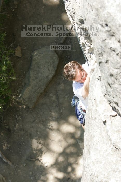 Me on the dyno while top roping Lick the Window (5.10c), shot (by Andrew Dreher) from the top of Ack! (5.11b, but using the crack for the start instead) that I top roped up with my camera on my back.  It was another long day of rock climbing at Seismic Wall on Austin's Barton Creek Greenbelt, Sunday, April 5, 2009.

Filename: SRM_20090405_14391641.jpg
Aperture: f/5.6
Shutter Speed: 1/500
Body: Canon EOS-1D Mark II
Lens: Canon EF 80-200mm f/2.8 L