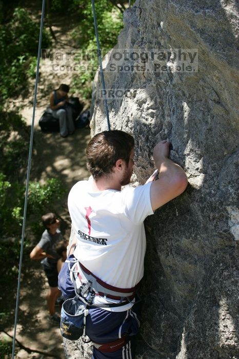 Me top roping Lick the Window (5.10c), shot (by Andrew Dreher) from the top of Ack! (5.11b, but using the crack for the start instead) that I top roped up with my camera on my back.  It was another long day of rock climbing at Seismic Wall on Austin's Barton Creek Greenbelt, Sunday, April 5, 2009.

Filename: SRM_20090405_14414863.jpg
Aperture: f/7.1
Shutter Speed: 1/500
Body: Canon EOS-1D Mark II
Lens: Canon EF 80-200mm f/2.8 L