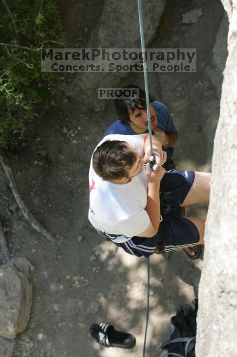 Me top roping Lick the Window (5.10c), shot (by Andrew Dreher) from the top of Ack! (5.11b, but using the crack for the start instead) that I top roped up with my camera on my back.  It was another long day of rock climbing at Seismic Wall on Austin's Barton Creek Greenbelt, Sunday, April 5, 2009.

Filename: SRM_20090405_14433176.jpg
Aperture: f/5.6
Shutter Speed: 1/500
Body: Canon EOS-1D Mark II
Lens: Canon EF 80-200mm f/2.8 L