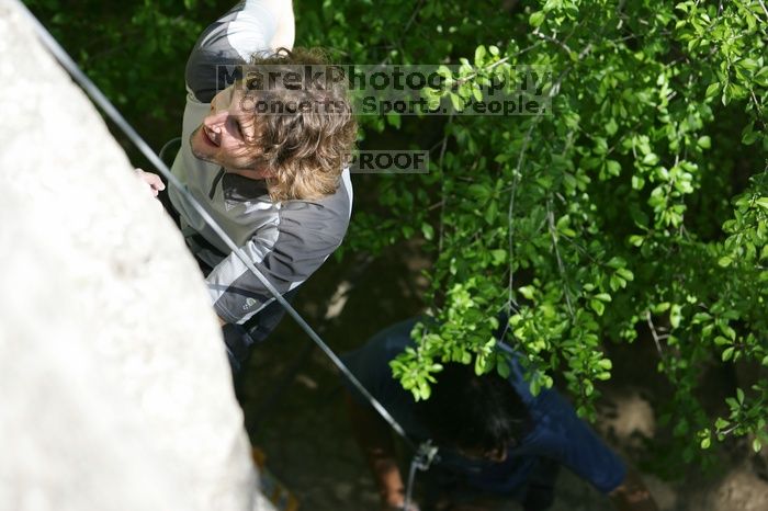 Javier Morales top rope climbing She's No Dog, She's My Wife (5.11b), shot from the top of Ack! (5.11b, but using the crack for the start instead) that I top roped up with my camera on my back.  It was another long day of rock climbing at Seismic Wall on Austin's Barton Creek Greenbelt, Sunday, April 5, 2009.

Filename: SRM_20090405_16352833.jpg
Aperture: f/4.0
Shutter Speed: 1/500
Body: Canon EOS-1D Mark II
Lens: Canon EF 80-200mm f/2.8 L