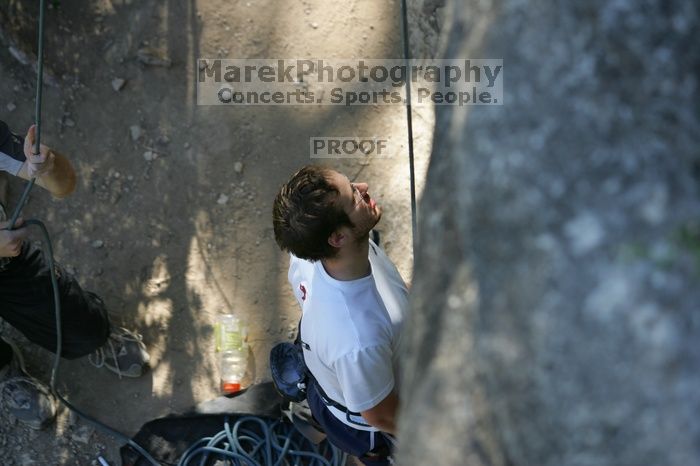 Me top roping Lick the Window (5.10c), shot by Javier Morales from the top of Ack! (5.11b, but using the crack for the start instead) that I top roped up with my camera on my back.  It was another long day of rock climbing at Seismic Wall on Austin's Barton Creek Greenbelt, Sunday, April 5, 2009.

Filename: SRM_20090405_17173691.jpg
Aperture: f/3.2
Shutter Speed: 1/400
Body: Canon EOS-1D Mark II
Lens: Canon EF 80-200mm f/2.8 L