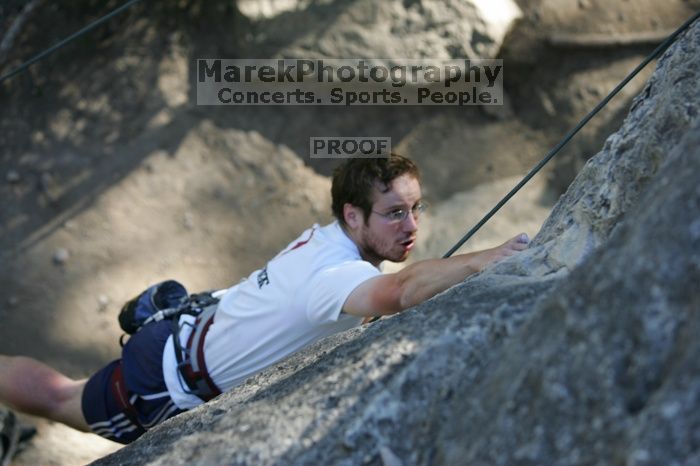 Me top roping Lick the Window (5.10c), shot by Javier Morales from the top of Ack! (5.11b, but using the crack for the start instead) that I top roped up with my camera on my back.  It was another long day of rock climbing at Seismic Wall on Austin's Barton Creek Greenbelt, Sunday, April 5, 2009.

Filename: SRM_20090405_17181503.jpg
Aperture: f/3.2
Shutter Speed: 1/400
Body: Canon EOS-1D Mark II
Lens: Canon EF 80-200mm f/2.8 L