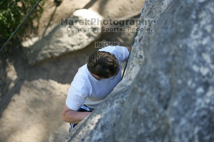 Me top roping Lick the Window (5.10c), shot by Javier Morales from the top of Ack! (5.11b, but using the crack for the start instead) that I top roped up with my camera on my back.  It was another long day of rock climbing at Seismic Wall on Austin's Barton Creek Greenbelt, Sunday, April 5, 2009.

Filename: SRM_20090405_17183127.jpg
Aperture: f/2.8
Shutter Speed: 1/400
Body: Canon EOS-1D Mark II
Lens: Canon EF 80-200mm f/2.8 L