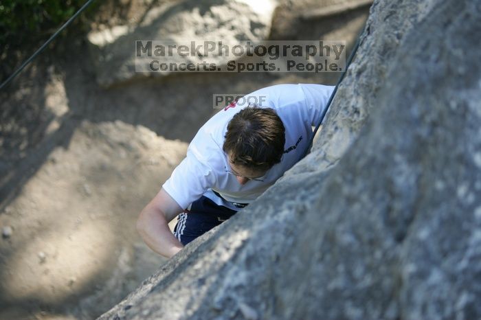 Me top roping Lick the Window (5.10c), shot by Javier Morales from the top of Ack! (5.11b, but using the crack for the start instead) that I top roped up with my camera on my back.  It was another long day of rock climbing at Seismic Wall on Austin's Barton Creek Greenbelt, Sunday, April 5, 2009.

Filename: SRM_20090405_17183532.jpg
Aperture: f/2.8
Shutter Speed: 1/400
Body: Canon EOS-1D Mark II
Lens: Canon EF 80-200mm f/2.8 L