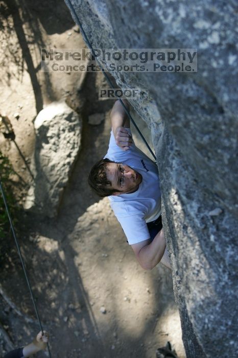 Me top roping Lick the Window (5.10c), shot by Javier Morales from the top of Ack! (5.11b, but using the crack for the start instead) that I top roped up with my camera on my back.  It was another long day of rock climbing at Seismic Wall on Austin's Barton Creek Greenbelt, Sunday, April 5, 2009.

Filename: SRM_20090405_17185747.jpg
Aperture: f/3.2
Shutter Speed: 1/400
Body: Canon EOS-1D Mark II
Lens: Canon EF 80-200mm f/2.8 L