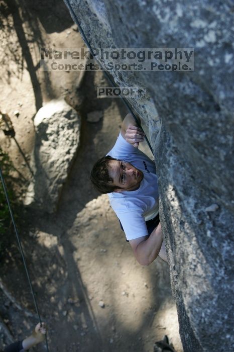 Me top roping Lick the Window (5.10c), shot by Javier Morales from the top of Ack! (5.11b, but using the crack for the start instead) that I top roped up with my camera on my back.  It was another long day of rock climbing at Seismic Wall on Austin's Barton Creek Greenbelt, Sunday, April 5, 2009.

Filename: SRM_20090405_17185848.jpg
Aperture: f/3.5
Shutter Speed: 1/400
Body: Canon EOS-1D Mark II
Lens: Canon EF 80-200mm f/2.8 L