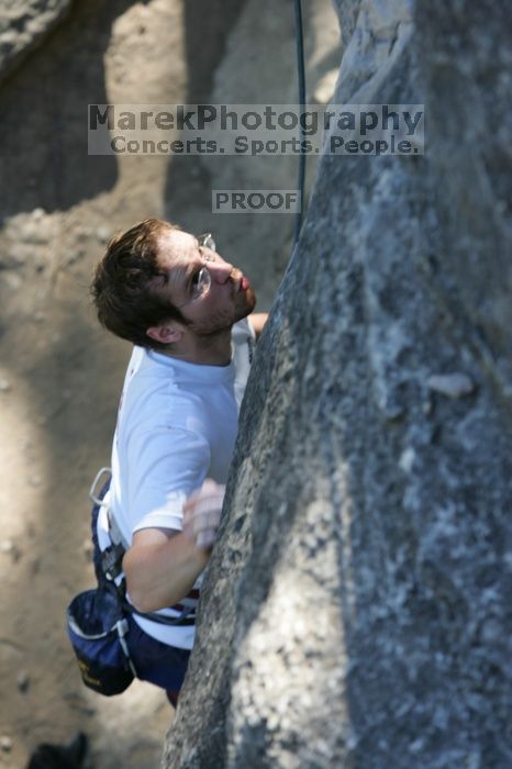 Me top roping Lick the Window (5.10c), shot by Javier Morales from the top of Ack! (5.11b, but using the crack for the start instead) that I top roped up with my camera on my back.  It was another long day of rock climbing at Seismic Wall on Austin's Barton Creek Greenbelt, Sunday, April 5, 2009.

Filename: SRM_20090405_17232308.jpg
Aperture: f/5.0
Shutter Speed: 1/320
Body: Canon EOS-1D Mark II
Lens: Canon EF 80-200mm f/2.8 L