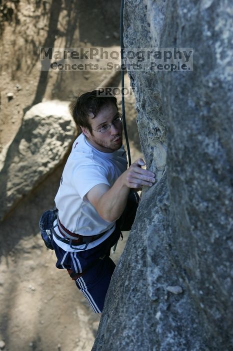 Me top roping Lick the Window (5.10c), shot by Javier Morales from the top of Ack! (5.11b, but using the crack for the start instead) that I top roped up with my camera on my back.  It was another long day of rock climbing at Seismic Wall on Austin's Barton Creek Greenbelt, Sunday, April 5, 2009.

Filename: SRM_20090405_17263169.jpg
Aperture: f/5.0
Shutter Speed: 1/320
Body: Canon EOS-1D Mark II
Lens: Canon EF 80-200mm f/2.8 L