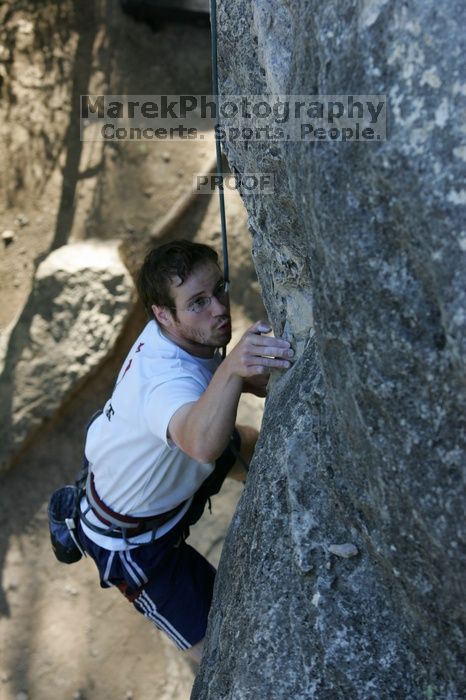 Me top roping Lick the Window (5.10c), shot by Javier Morales from the top of Ack! (5.11b, but using the crack for the start instead) that I top roped up with my camera on my back.  It was another long day of rock climbing at Seismic Wall on Austin's Barton Creek Greenbelt, Sunday, April 5, 2009.

Filename: SRM_20090405_17264983.jpg
Aperture: f/5.0
Shutter Speed: 1/320
Body: Canon EOS-1D Mark II
Lens: Canon EF 80-200mm f/2.8 L