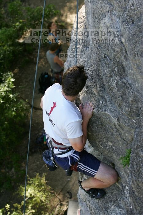 Me top roping Lick the Window (5.10c), shot by Javier Morales from the top of Ack! (5.11b, but using the crack for the start instead) that I top roped up with my camera on my back.  It was another long day of rock climbing at Seismic Wall on Austin's Barton Creek Greenbelt, Sunday, April 5, 2009.

Filename: SRM_20090405_17285141.jpg
Aperture: f/4.5
Shutter Speed: 1/320
Body: Canon EOS-1D Mark II
Lens: Canon EF 80-200mm f/2.8 L