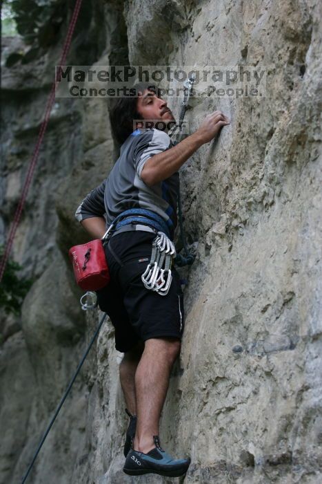 Javier Morales leading up Angel of Poets (5.10a).  It was another long day of rock climbing at Seismic Wall on Austin's Barton Creek Greenbelt, Saturday, April 11, 2009.

Filename: SRM_20090411_12360708.JPG
Aperture: f/5.0
Shutter Speed: 1/250
Body: Canon EOS-1D Mark II
Lens: Canon EF 80-200mm f/2.8 L