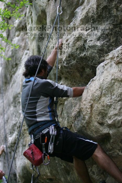 Javier Morales lead climbing Nose Print on the Windshield (5.11c).  It was another long day of rock climbing at Seismic Wall on Austin's Barton Creek Greenbelt, Saturday, April 11, 2009.

Filename: SRM_20090411_13215639.JPG
Aperture: f/2.8
Shutter Speed: 1/250
Body: Canon EOS-1D Mark II
Lens: Canon EF 80-200mm f/2.8 L