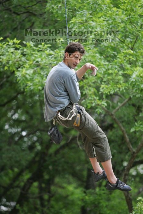Someone taking a big fall on Cuttin Cards for a Poke (5.12+).  It was another long day of rock climbing at Seismic Wall on Austin's Barton Creek Greenbelt, Saturday, April 11, 2009.

Filename: SRM_20090411_13323660.JPG
Aperture: f/2.8
Shutter Speed: 1/500
Body: Canon EOS-1D Mark II
Lens: Canon EF 80-200mm f/2.8 L