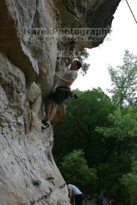 Adam Libson climbing Diving for Rocks (5.10d), shot by Andrew Dreher.  It was another long day of rock climbing at Seismic Wall on Austin's Barton Creek Greenbelt, Saturday, April 11, 2009.

Filename: SRM_20090411_15563630.JPG
Aperture: f/7.1
Shutter Speed: 1/200
Body: Canon EOS-1D Mark II
Lens: Canon EF 16-35mm f/2.8 L