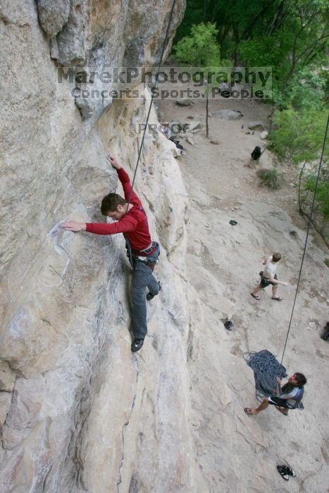 Me top rope climbing Diving for Rocks (5.10d) with Javier Morales belaying, photographed from  the third bolt of Magster (5.10a) by Andrew Dreher.  It was another long day of rock climbing at Seismic Wall on Austin's Barton Creek Greenbelt, Saturday, April 11, 2009.

Filename: SRM_20090411_17071812.JPG
Aperture: f/5.6
Shutter Speed: 1/320
Body: Canon EOS-1D Mark II
Lens: Canon EF 16-35mm f/2.8 L
