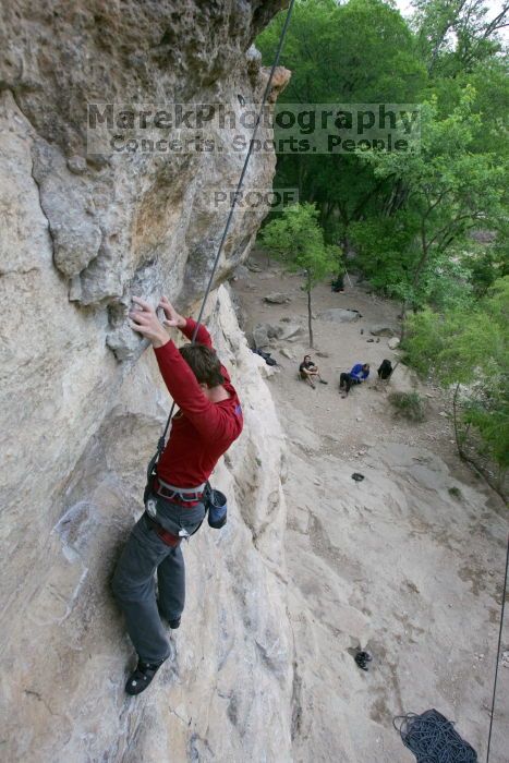Me top rope climbing Diving for Rocks (5.10d), photographed from  the third bolt of Magster (5.10a) by Andrew Dreher.  It was another long day of rock climbing at Seismic Wall on Austin's Barton Creek Greenbelt, Saturday, April 11, 2009.

Filename: SRM_20090411_17102149.JPG
Aperture: f/5.6
Shutter Speed: 1/320
Body: Canon EOS-1D Mark II
Lens: Canon EF 16-35mm f/2.8 L