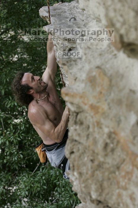 Jason Shear competing.  CTM hosted a speed climbing event at Seismic Wall on Diving for Rocks to benefit the Austin Area Food Bank, Saturday, May 9, 2009.

Filename: SRM_20090509_11214284.jpg
Aperture: f/5.0
Shutter Speed: 1/500
Body: Canon EOS-1D Mark II
Lens: Canon EF 80-200mm f/2.8 L
