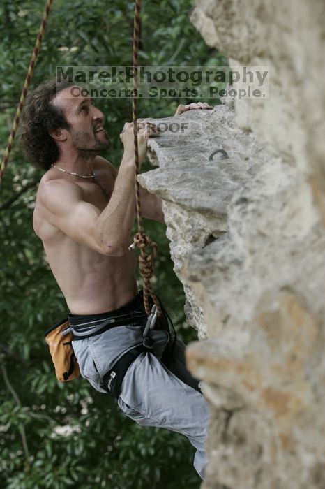 Jason Shear competing.  CTM hosted a speed climbing event at Seismic Wall on Diving for Rocks to benefit the Austin Area Food Bank, Saturday, May 9, 2009.

Filename: SRM_20090509_11214491.jpg
Aperture: f/5.0
Shutter Speed: 1/500
Body: Canon EOS-1D Mark II
Lens: Canon EF 80-200mm f/2.8 L
