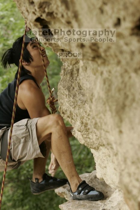 Long Ta, winner of the speed competition with a time of 15.33 seconds.  CTM hosted a speed climbing event at Seismic Wall on Diving for Rocks to benefit the Austin Area Food Bank, Saturday, May 9, 2009.

Filename: SRM_20090509_11333455.jpg
Aperture: f/5.6
Shutter Speed: 1/320
Body: Canon EOS-1D Mark II
Lens: Canon EF 80-200mm f/2.8 L