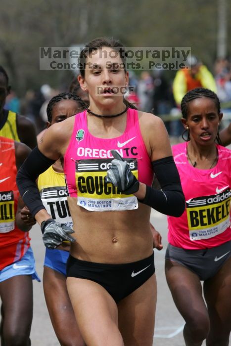 Kara Goucher was the third female to cross the finish line with a time of 2:32:25.  The 113th Boston Marathon took place on Monday, April 20, 2009.

Filename: SRM_20090420_10333801.JPG
Aperture: f/8.0
Shutter Speed: 1/1000
Body: Canon EOS-1D Mark II
Lens: Canon EF 100-400mm f/4.5-5.6 L IS USM